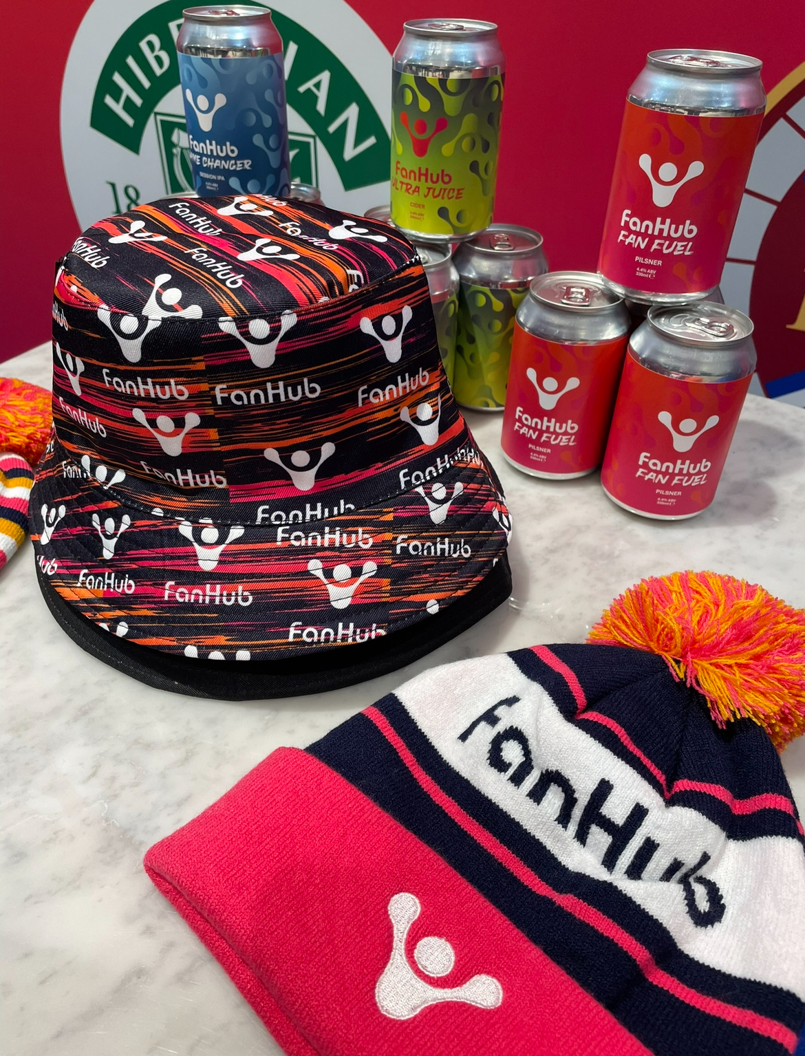 FanHub merch and Fan Fuel beer can range